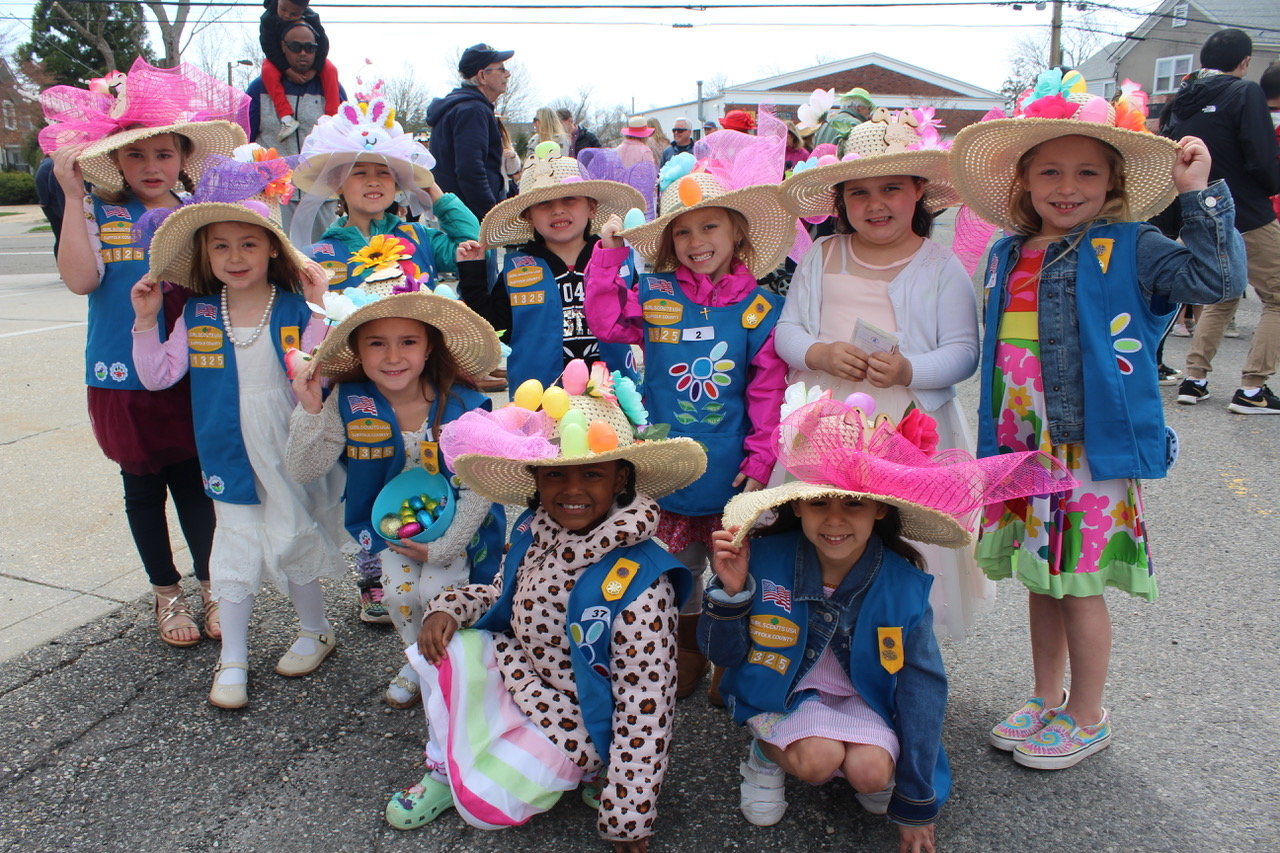Daisy Troop 1325 smiles for the camera. They decorated their hats themselves.
